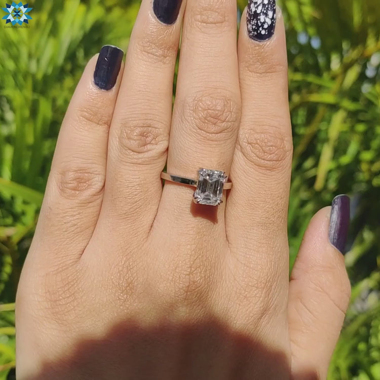 Simple moissanite solitaire ring with elegant claw setting.
