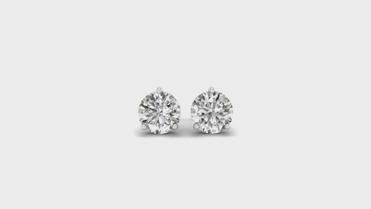 Handmade jewellery with round diamond studs.
