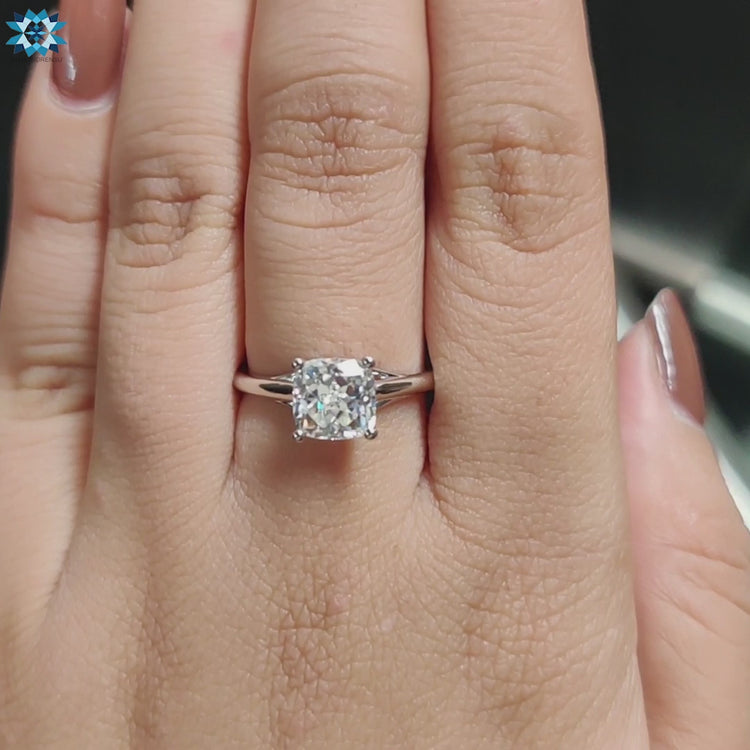 Cushion Rensu cut engagement ring crafted in a handmade white gold design.
