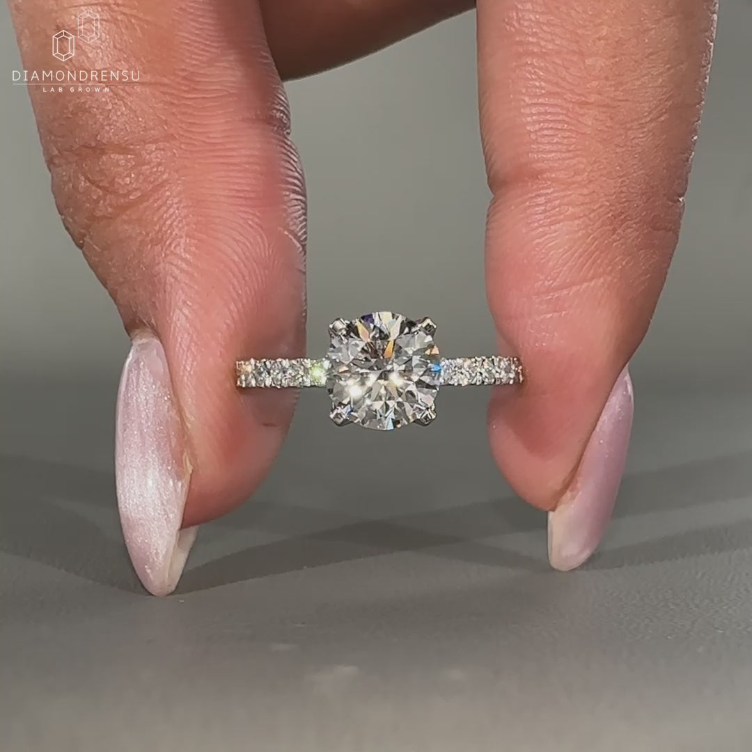 Round diamond ring in white gold design.
