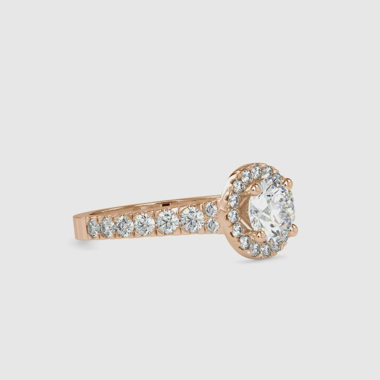 Custom engagement ring with round diamond and 4 prongs.
