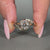 Solitaire engagement ring featuring six prong setting.
