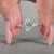 Oval cut diamond ring in white gold ring design.
