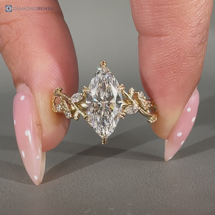 Nature inspired marquise ring with filigree details.