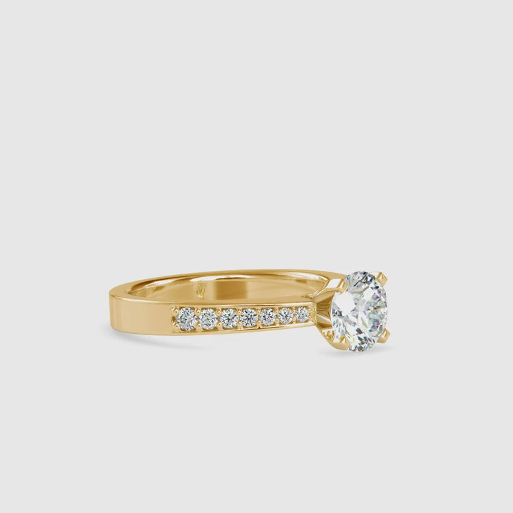 IGI certified handmade jewellery showcasing a classic round cut diamond ring.
