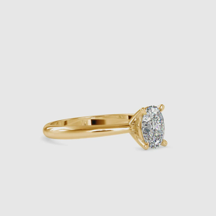 Oval centre stone engagement ring with 4 claw setting.
