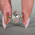 Handmade oval rose cut ring with open gallery setting.