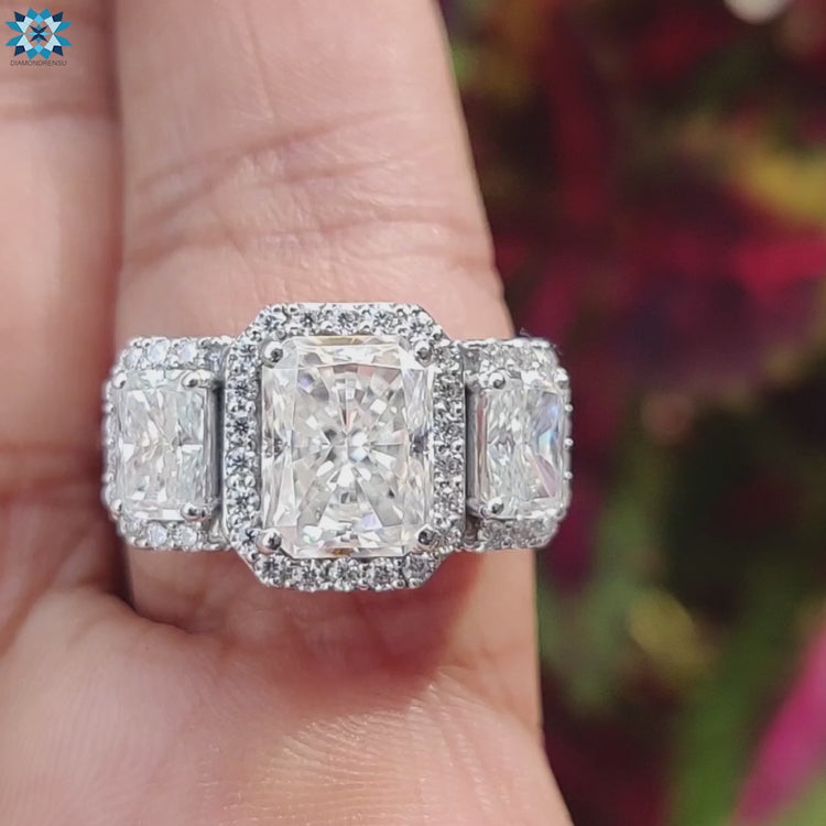 Buy radiant cut moissanite ring with halo and side stones.
