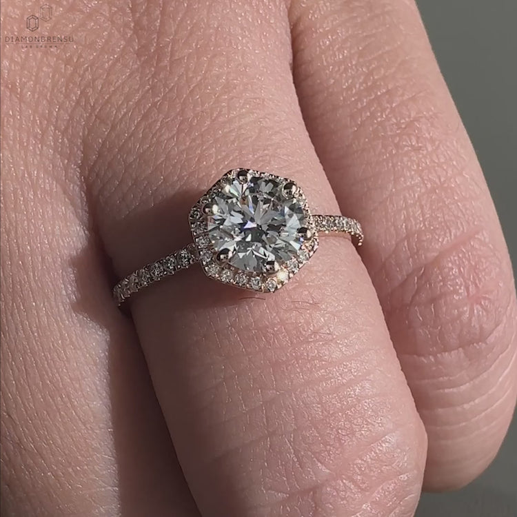 Halo ring ring featuring a diamond engagement ring with a six prong diamond ring design for ultimate sparkle.