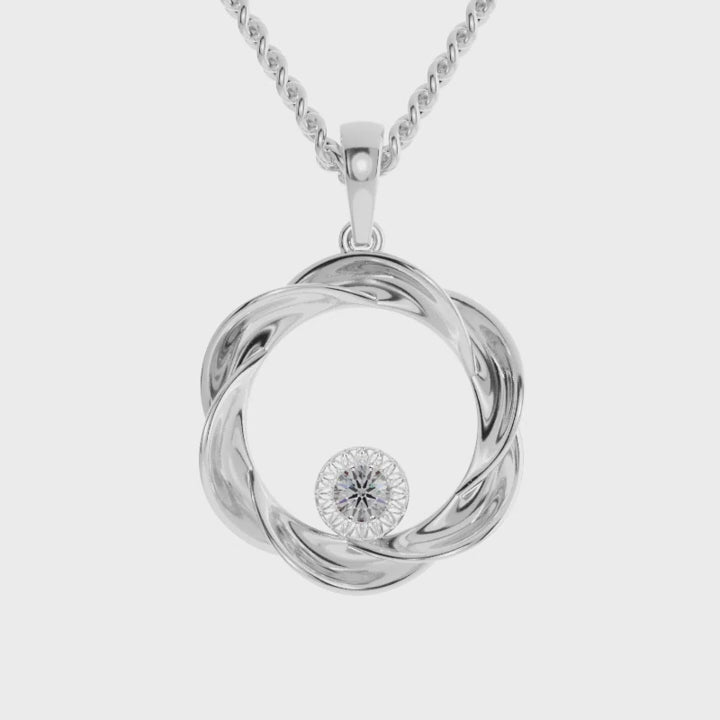 Elegant white gold pendant with twisted loop and diamond.