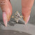 Nature inspired marquise diamond ring with four prong setting.