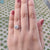 Diamondrensu UK engagement ring featuring a stunning moissanite halo ring.