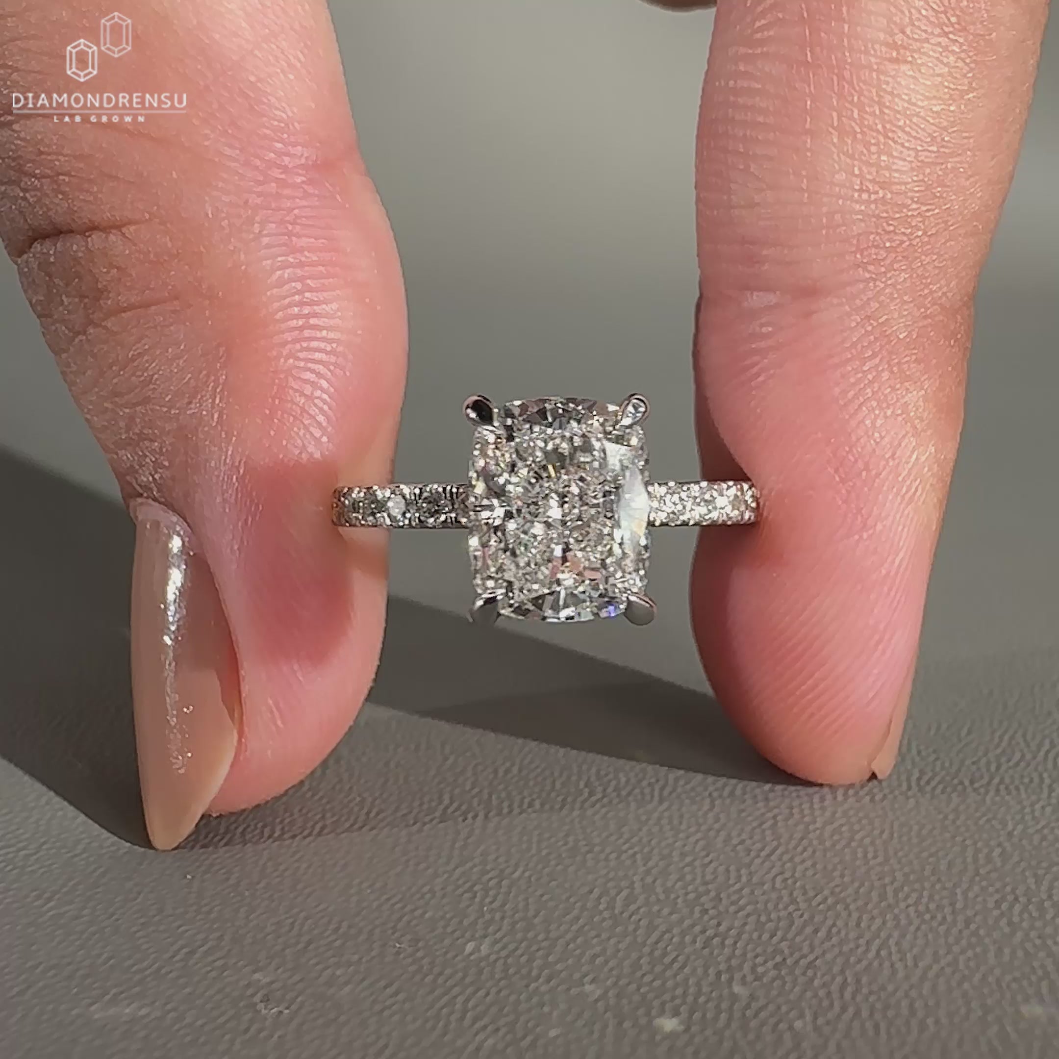 Round diamond pave band in white gold for UK engagement ring buyers.
