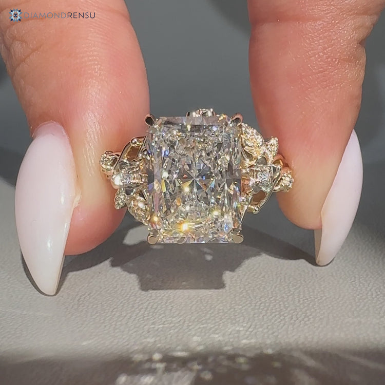 Nature inspired radiant diamond ring with twisted shank.