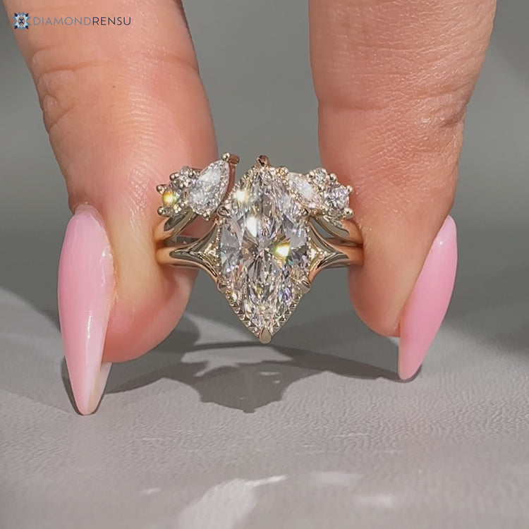 Marquise diamond bridal set with milgrain details.