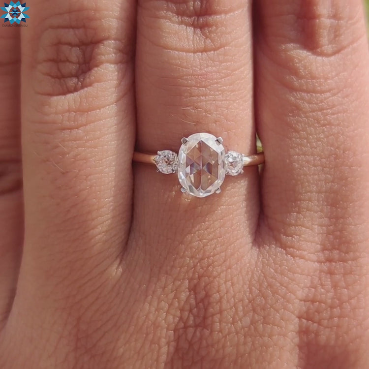 Rose cut moissanite ring with prong setting and mixed metal finish.
