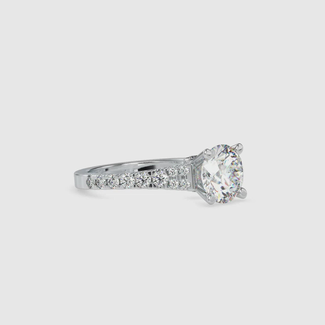 2 carat round cut diamond ring in a micro pave setting
