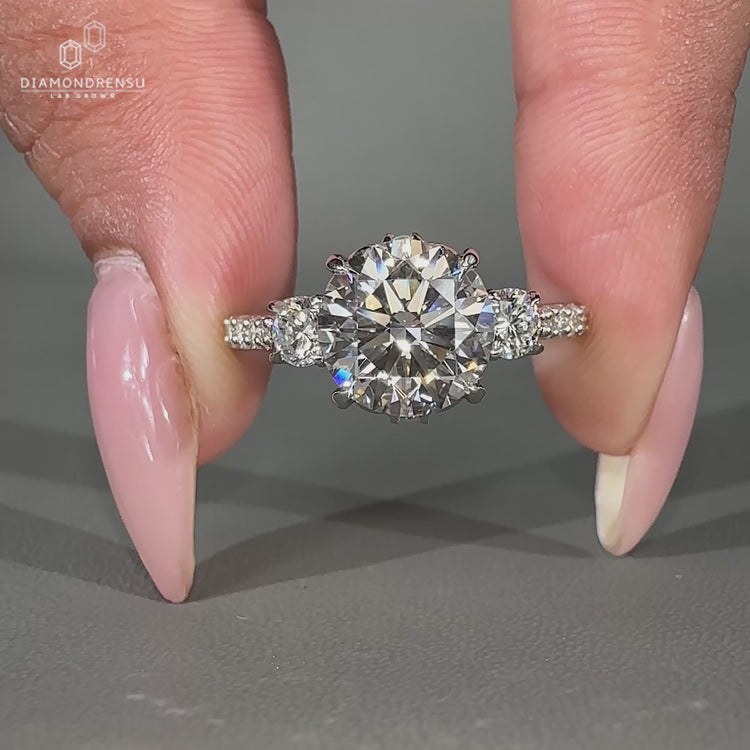 Three stone ring in prong setting ring style
