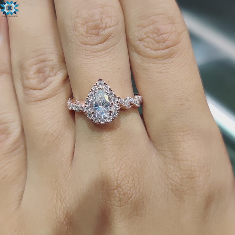 Diamondrensu UK custom pear moissanite engagement ring.

