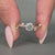 Nature inspired ring with round side stones setting
