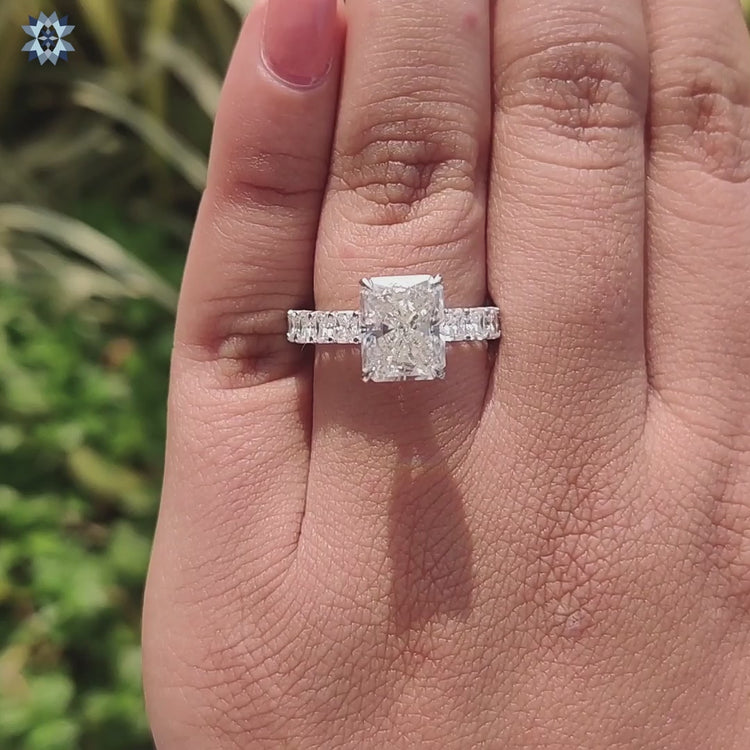 Hidden halo moissanite ring with 4 prong setting.
