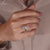 Custom engagement ring with marquise center.
