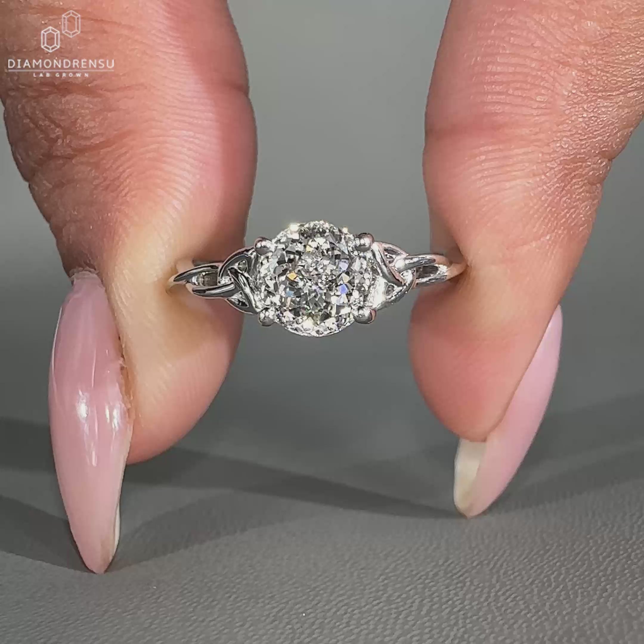 Portuguese cut ring with a 4 prong setting in white gold.
