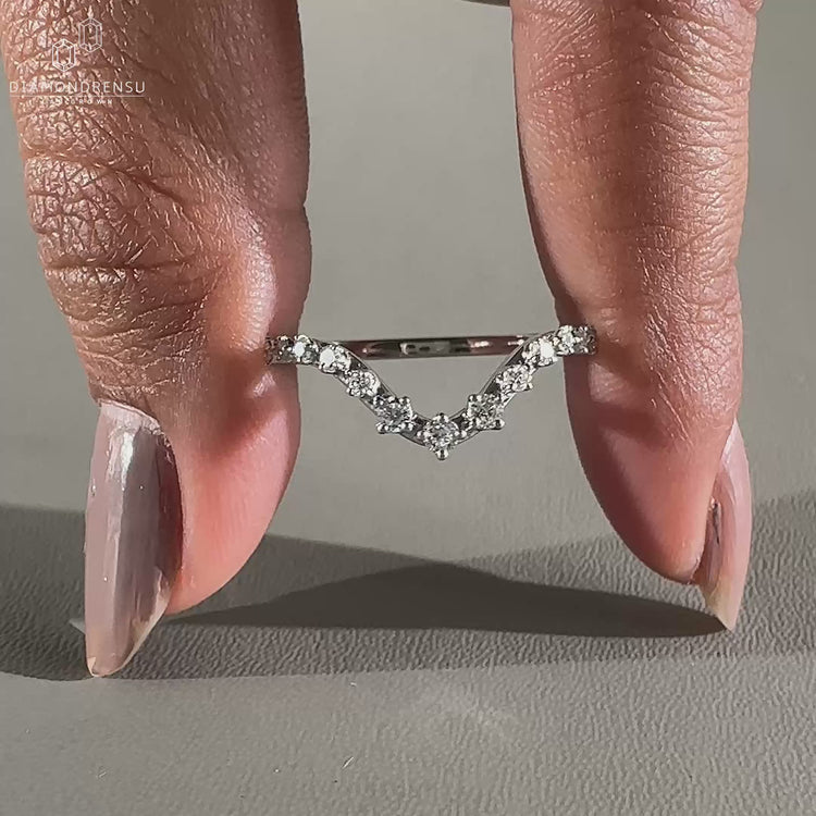 White gold curved diamond wedding band.
