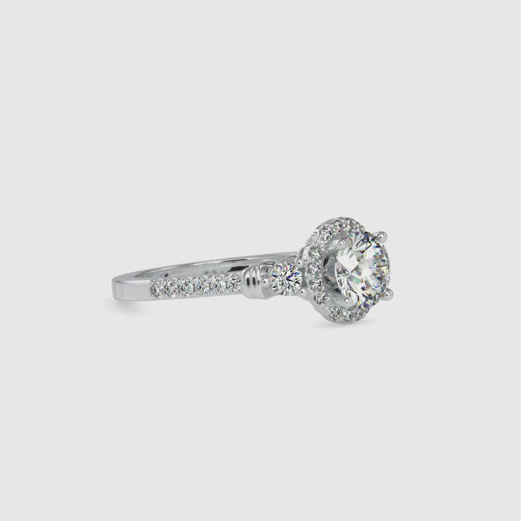Custom design floral engagement ring in white gold.