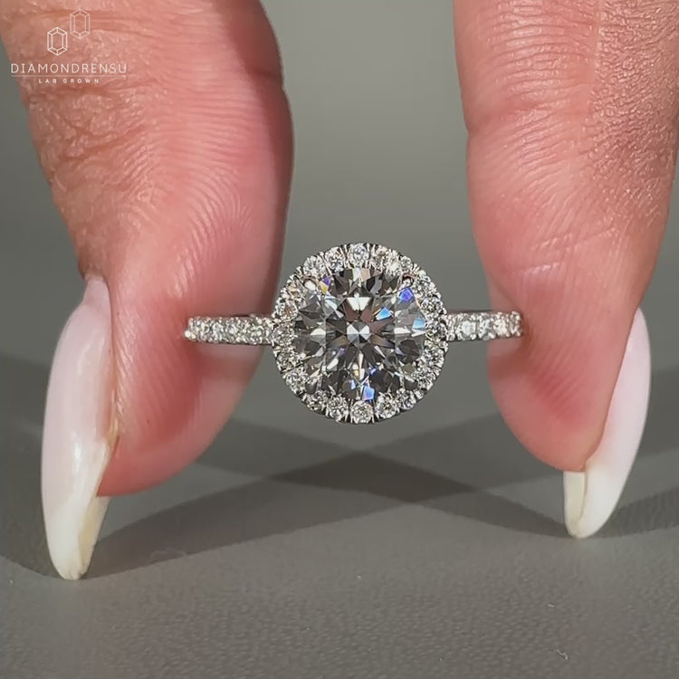 Halo diamond ring crafted in white gold.
