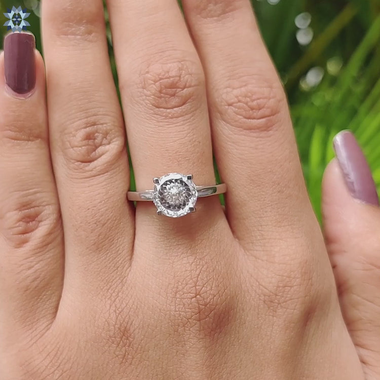 Handmade engagement ring with custom moissanite stone.
