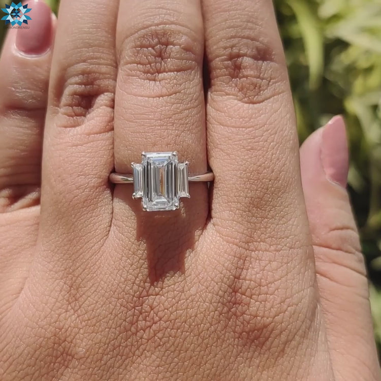 Minimalist solitaire ring with an elongated cushion cut center.
