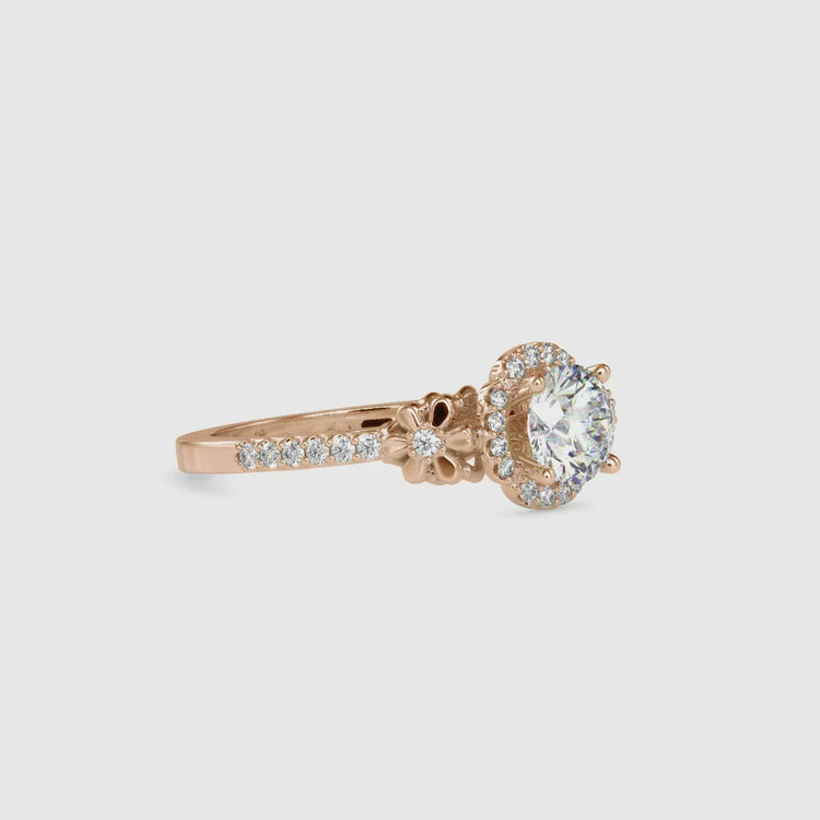 Lab diamond ring in rose gold with round centre and floral pave band.