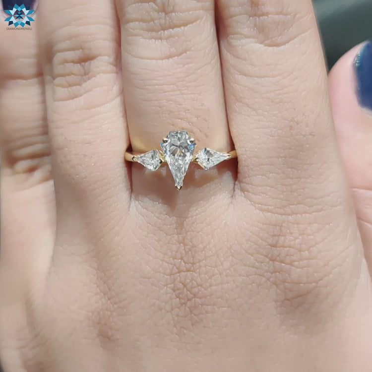 Diamondrensu UK spear cut engagement ring in yellow gold.
