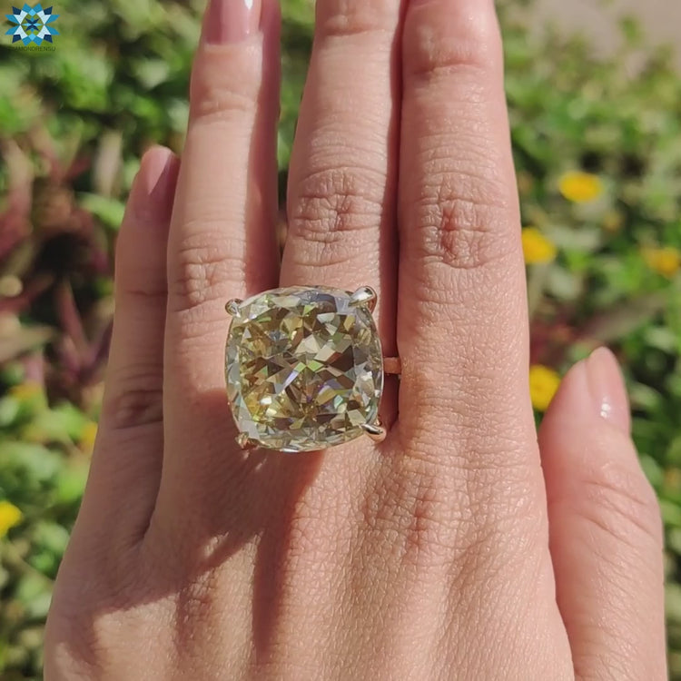 Cushion divine ring made with yellow moissanite.
