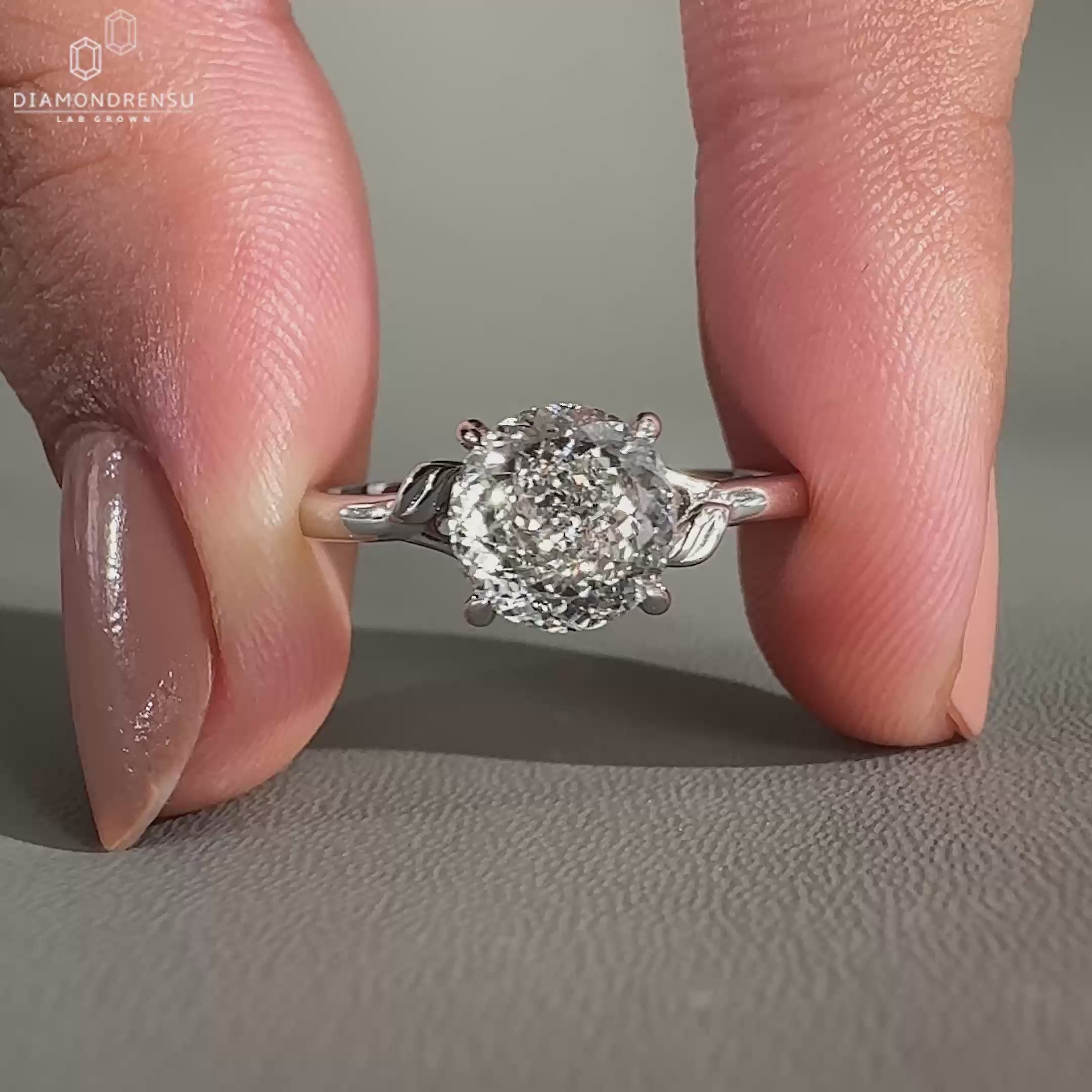 Solitaire engagement ring set in white gold ring.
