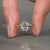 Cushion cut diamond ring showcasing soft edges.
