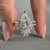 Pear engagement ring in solitaire setting.
