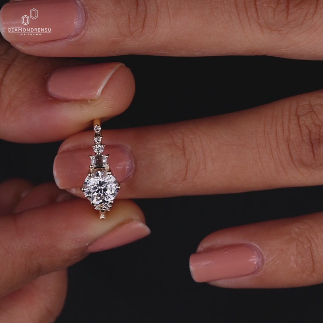 Round cut engagement ring featuring muse setting
