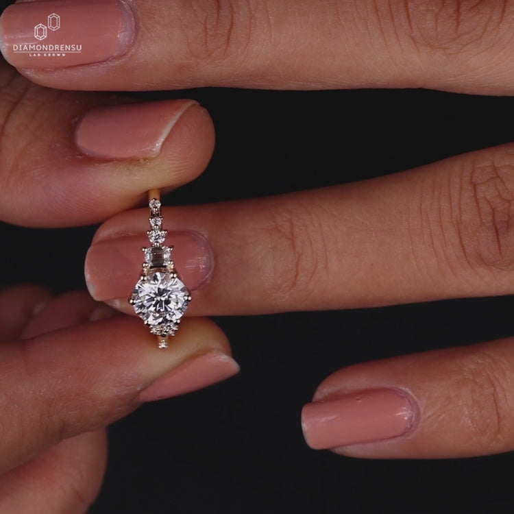 Round cut engagement ring featuring muse setting
