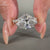 East west engagement ring with dual shank and two tone style.
