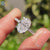 Oval cut ring with cathedral setting ring
