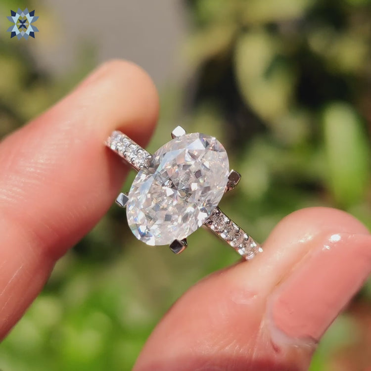 Oval cut ring with cathedral setting ring
