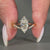Marquise Diamond Center Stone placed in yellow gold ring style.
