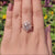 Round cut side stones on vintage engagement ring.