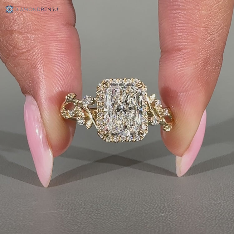 Handmade radiant cut ring with nature inspired style.