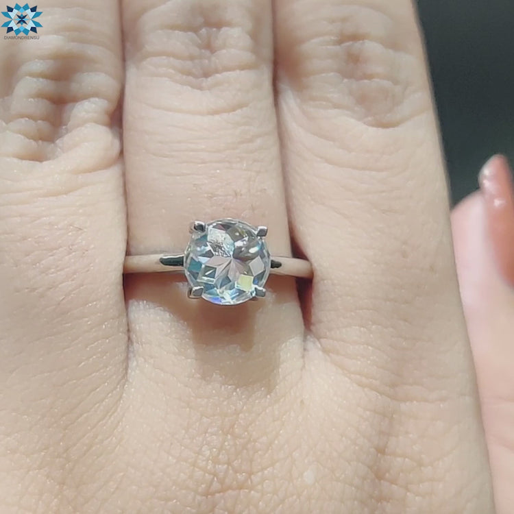 Custom engagement ring with round rose cut moissanite.
