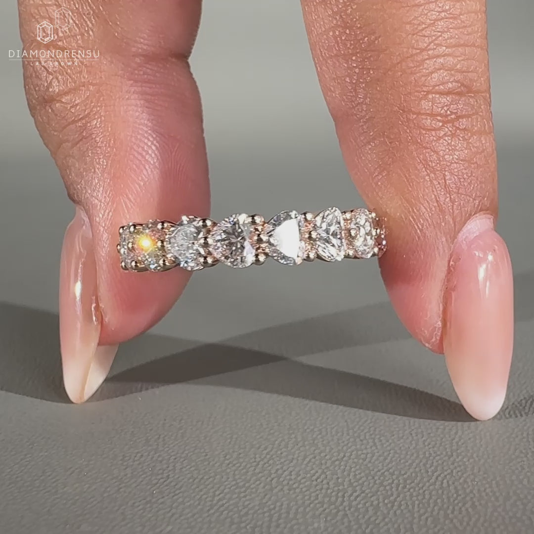 Eternity band with heart cut diamonds.
