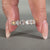 Eternity band with heart cut diamonds.
