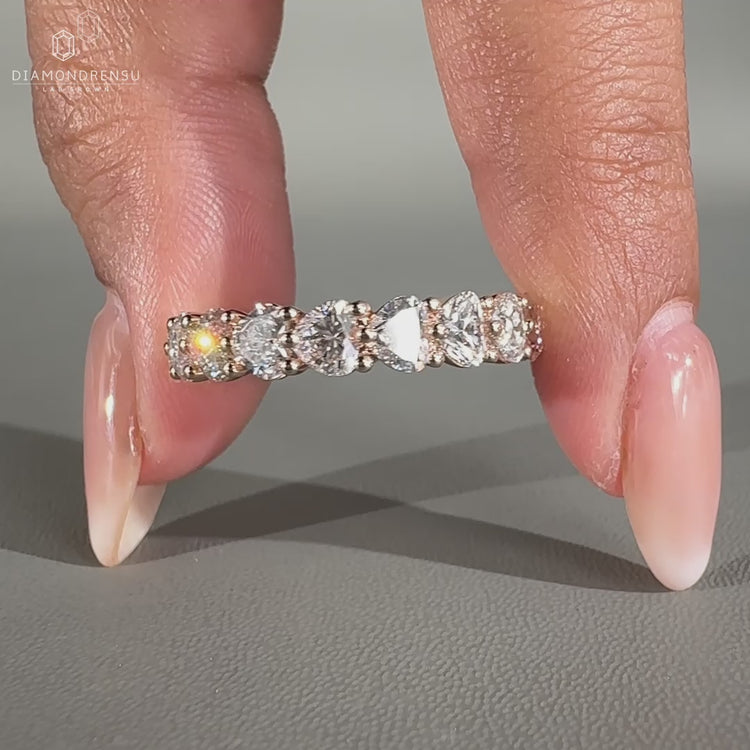 Eternity band with heart cut diamonds.
